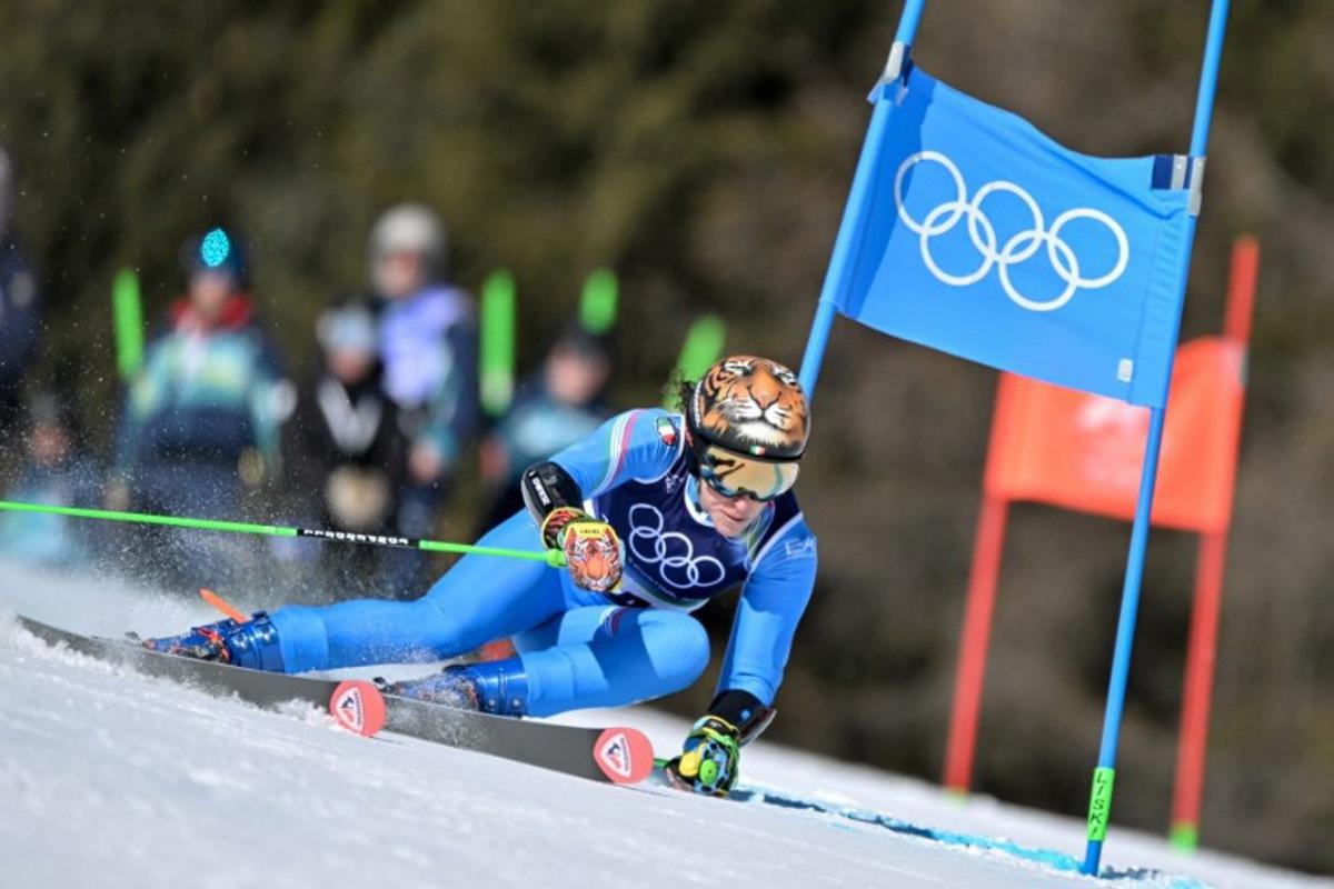 Italy's Federica Brignone competes in the first run of the women's giant slalom event during the Milano Cortina 2026 Winter Olympic Games at the Tofane Alpine Skiing Centre in Cortina d'Ampezzo on February 15, 2026. Tiziana FABI / AFP