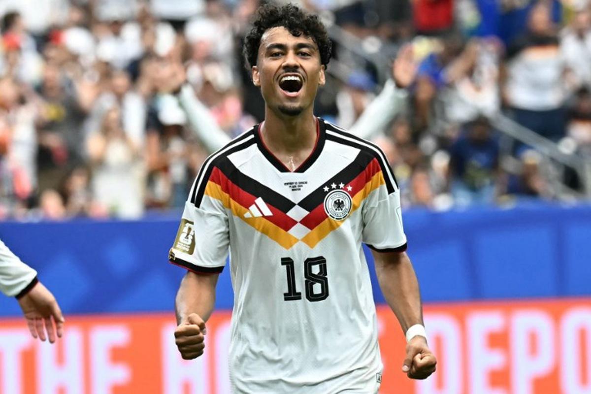 Germany's defender #18 Nathaniel Brown celebrates after scoring a goal during the 2026 World Cup Group E football match between Germany and Curacao at the Houston Stadium in Houston on June 14, 2026. Paul ELLIS / AFP