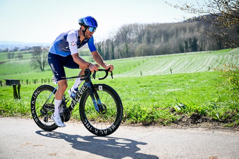 Belgian Tom Van Asbroeck of Israel-Premier Tech pictured in action during the men elite race of the 'Dwars Door Vlaanderen' cycling event, 184,2km from Roeselare to Waregem, Wednesday 02 April 2025. BELGA PHOTO DIRK WAEM