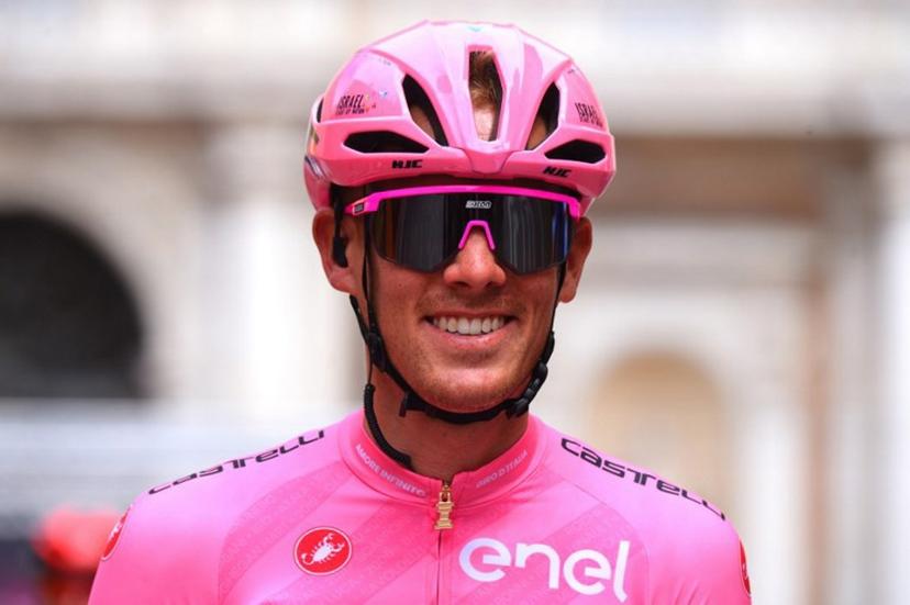 Team Israel Start-Up Nation rider Italy's Alessandro De Marchi, wearing the overall leader's pink jersey, smiles at the start of the fifth stage of the Giro d'Italia 2021 cycling race, 177 km between Modena and Cattolica, Emilia-Romagna, on May 12, 2021. Dario BELINGHERI / AFP