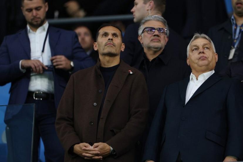 Manchester City's Emirati chairman Khaldoon al-Mubarak (L) and Hungary's Prime Minister Viktor Orban (R) watches from the stands during the English Premier League football match between Manchester City and Liverpool at the Etihad Stadium in Manchester, north west England, on November 9, 2025. Darren Staples / AFP