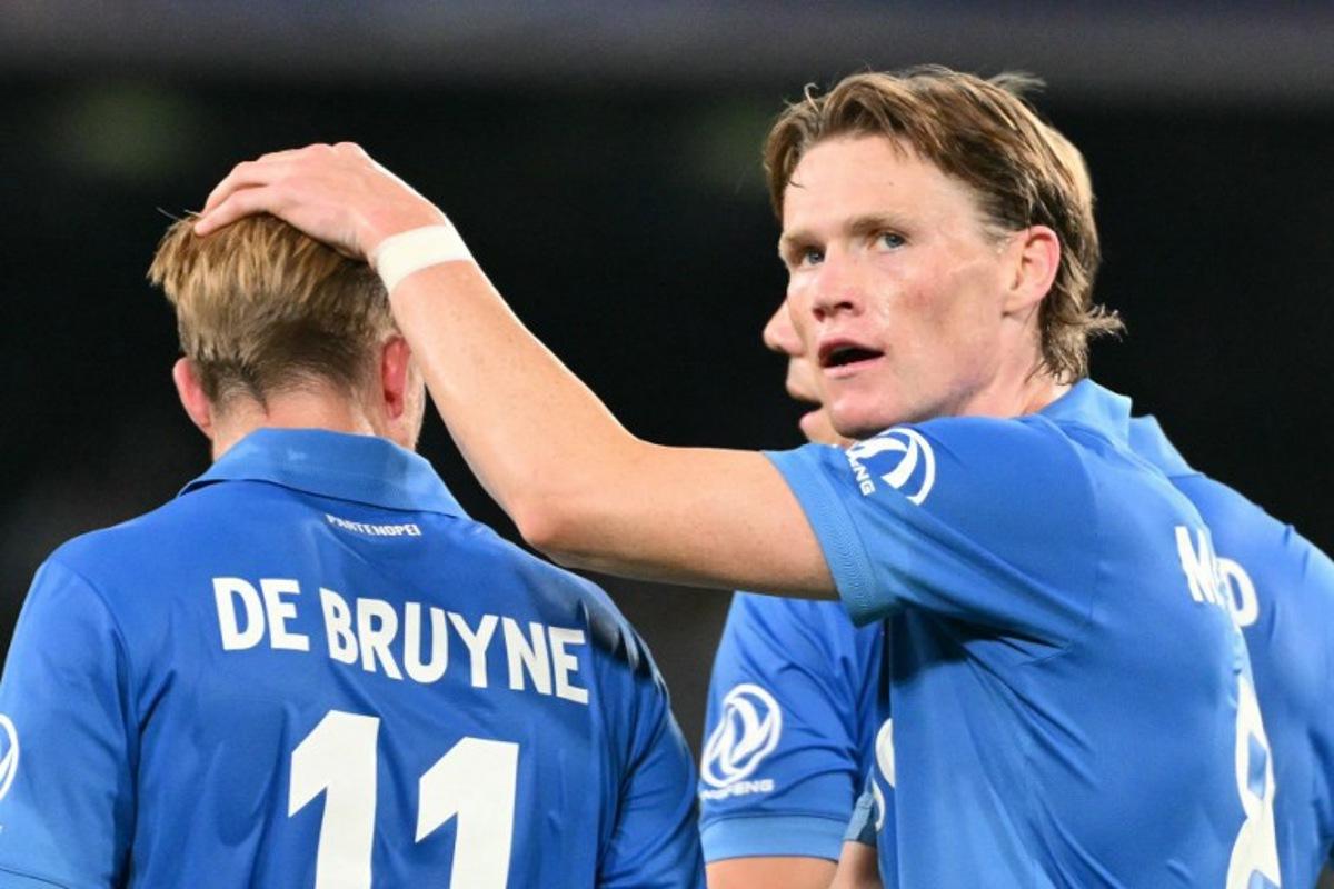 Napoli's Scottish midfielder #08 Scott McTominay celebrates scoring his team's second goal during the UEFA Champions League - first round day 3 football match between Napoli and Bodo Glimt at the Diego Armando Maradona stadium in Naples on October 20, 2026. Alberto PIZZOLI / AFP