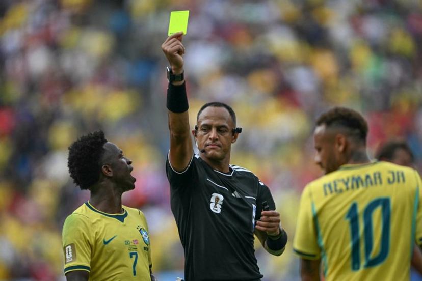 US referee Ismail Elfath shows a yellow card to Brazil's forward #10 Neymar (out of frame) during the 2026 World Cup round of 16 football match between Brazil and Norway at the New York/New Jersey Stadium in East Rutherford on July 5, 2026. MAURO PIMENTEL / AFP