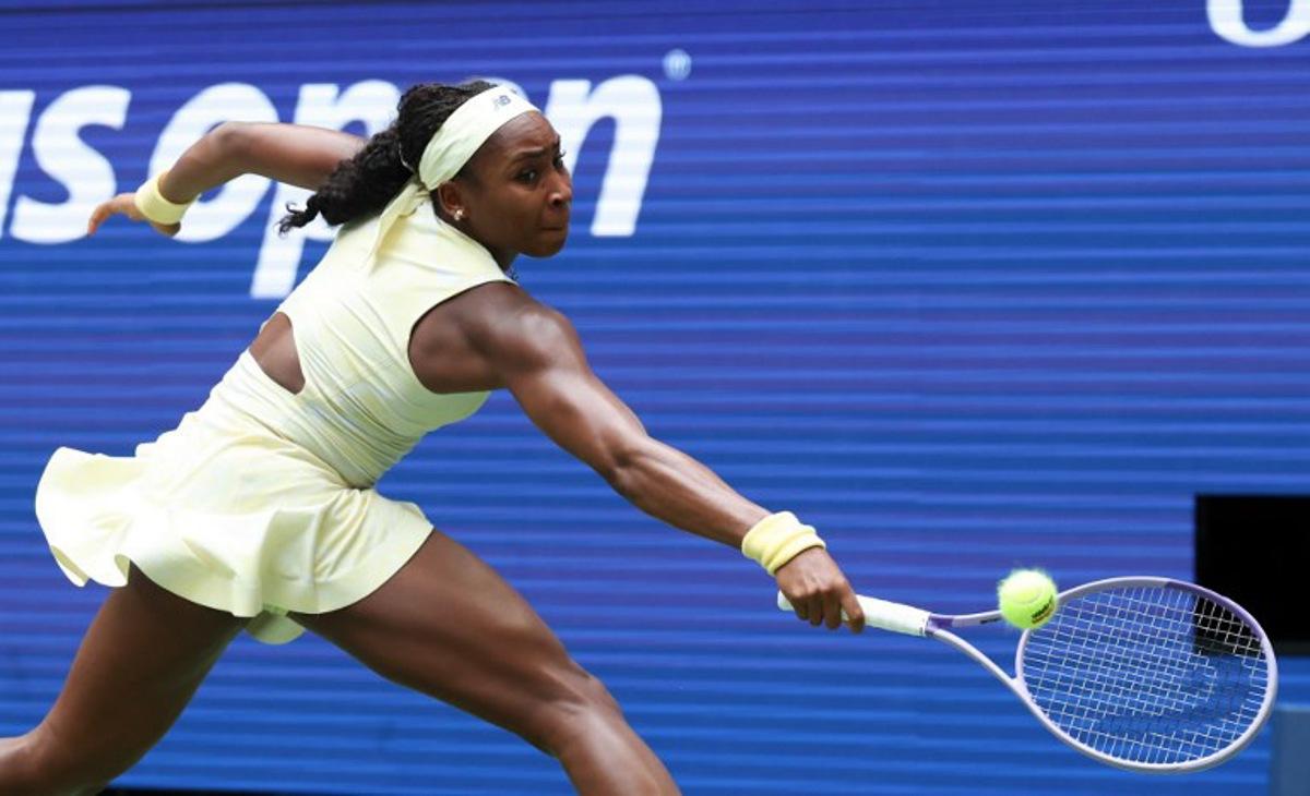 USA's Coco Gauff reaches to return the ball to Russia's Mirra Andreeva during their women's singles quarter-final tennis match on day eleven of the US Open tennis tournament at the USTA Billie Jean King National Tennis Center in New York on September 9, 2026. TIMOTHY A. CLARY / AFP
