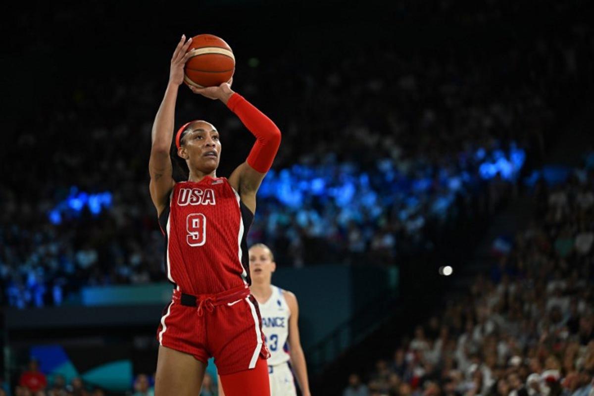 USA's #09 A'ja Wilson takes a free throw in the women's Gold Medal basketball match between France and the USA during the Paris 2024 Olympic Games at the Bercy Arena in Paris on August 11, 2024. Paul ELLIS / AFP