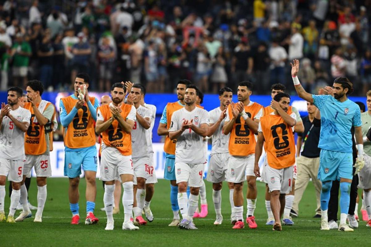 Iran's players greet supporters after the 2026 World Cup Group G football match between Iran and New Zealand at Los Angeles Stadium in Inglewood on June 15, 2026. Patrick T. Fallon / AFP