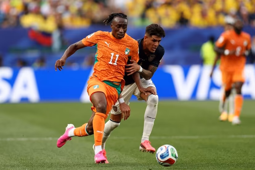 Ivory Coast's forward #11 Yan Diomande runs with the ball past Ecuador's defender #03 Piero Hincapie during the 2026 World Cup Group E football match between Ivory Coast and Ecuador at the Philadelphia Stadium in Philadelphia on June 14, 2026. CHARLY TRIBALLEAU / AFP