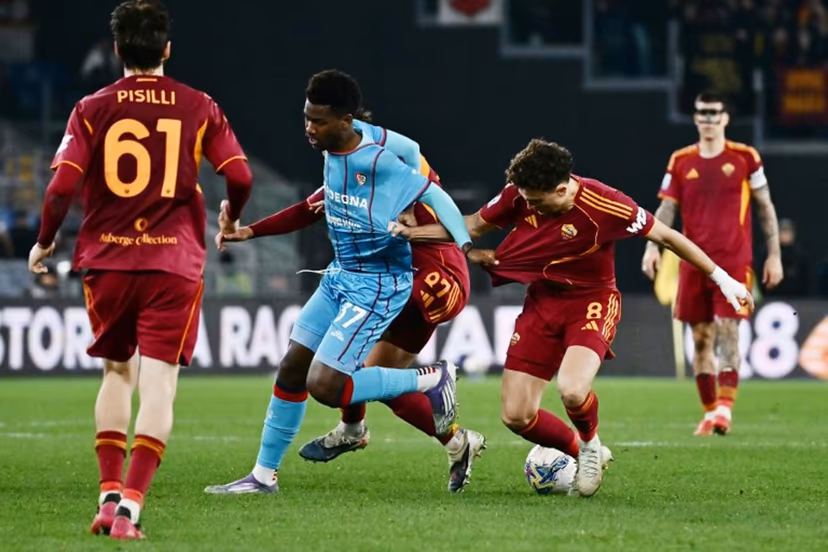 Roma's French midfielder #08 Neil El Aynaoui (R) and Cagliari's French forward #37 Yael Fritz Junior Trepy fight for the ball during the Italian Serie A football match between AS Roma and Cagliari at the Olympic Stadium in Rome on Febuary 9, 2026. Filippo MONTEFORTE / AFP