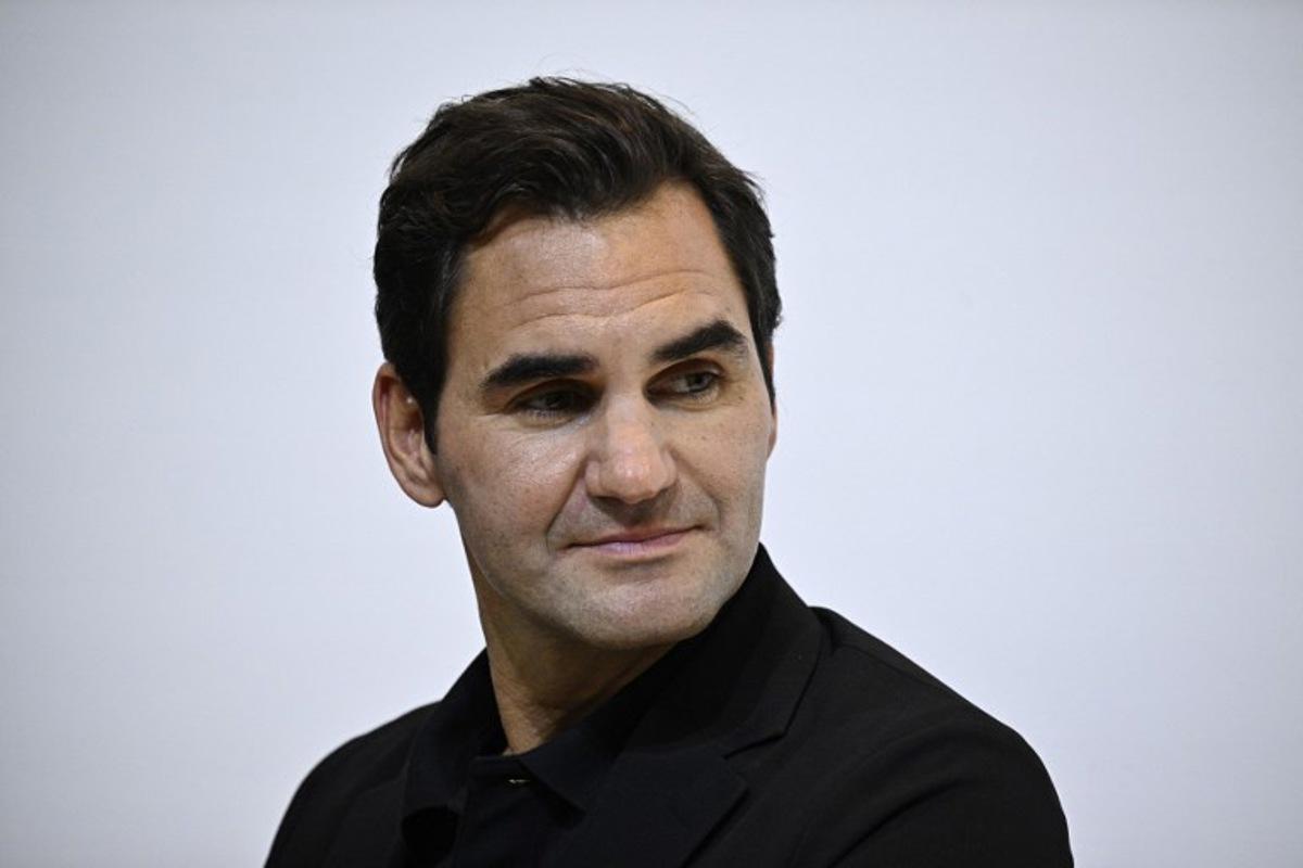 Swiss former tennis player Roger Federer an UNIQLO brand embassador attends the press conference for the 40th anniversary of Japanese ready-to-wear brand UNIQLO in Paris on September 30, 2024. JULIEN DE ROSA / AFP