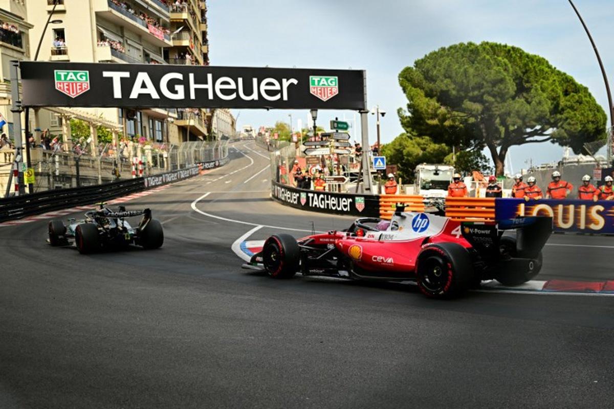 Mercedes' Italian driver Kimi Antonelli (L) leads the standing start followed by Ferrari's British driver Lewis Hamilton (R) during Monaco Formula 1 Grand Prix at the Monaco street circuit in Monaco, ahead of the, on June 7, 2026. Andrej ISAKOVIC / AFP