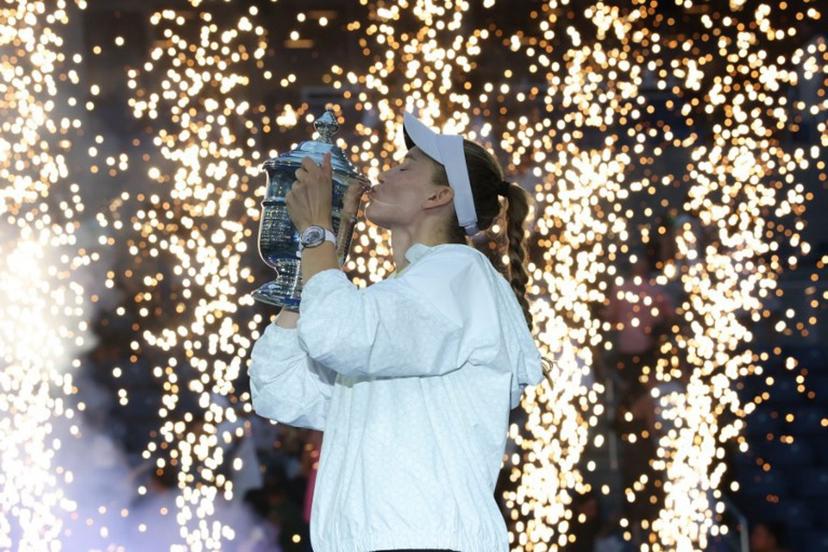 Kazakhstan's Elena Rybakina kisses the winner's trophy after winning the women's singles final tennis match against Belarus's Aryna Sabalenka on day fourteen of the US Open tennis tournament at the USTA Billie Jean King National Tennis Center in New York City on September 12, 2026. TIMOTHY A. CLARY / AFP