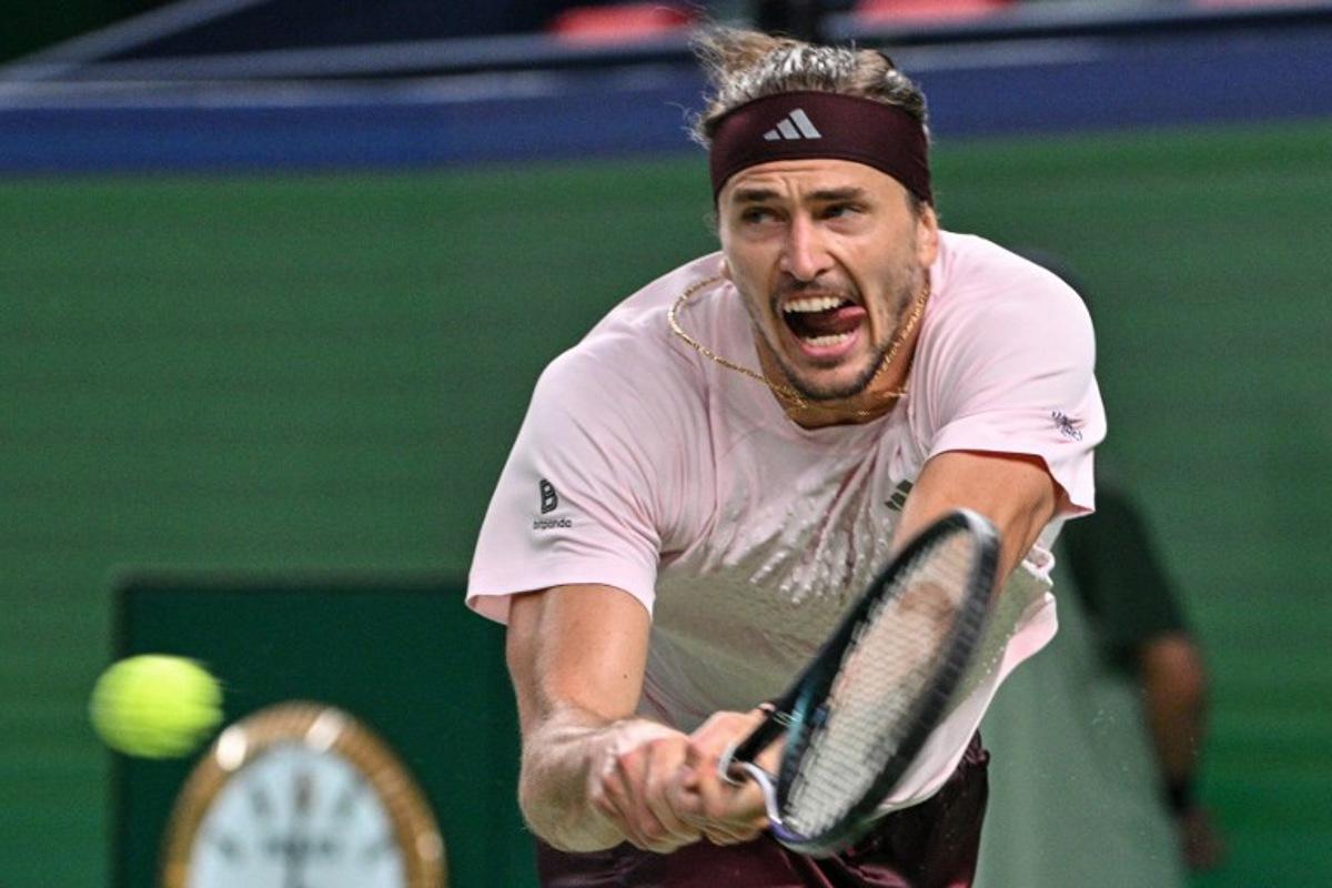 Germany's Alexander Zverev hits a return to Kazakhstan's Alexander Bublik during their men's singles match at the Shanghai Masters tennis tournament in Shanghai on October 13, 2026. Hector RETAMAL / AFP