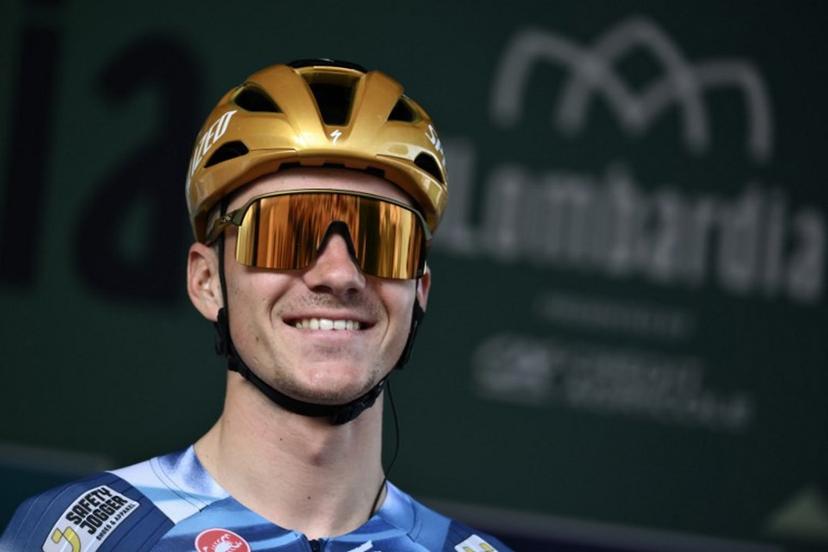 Soudal Quick-Step's Belgian rider Remco Evenepoel looks on from the sign-in podium ahead of the 119th edition of the Giro di Lombardia (Tour of Lombardy), a 238km cycling race from Como to Bergamo on October 11, 2025. Marco BERTORELLO / AFP