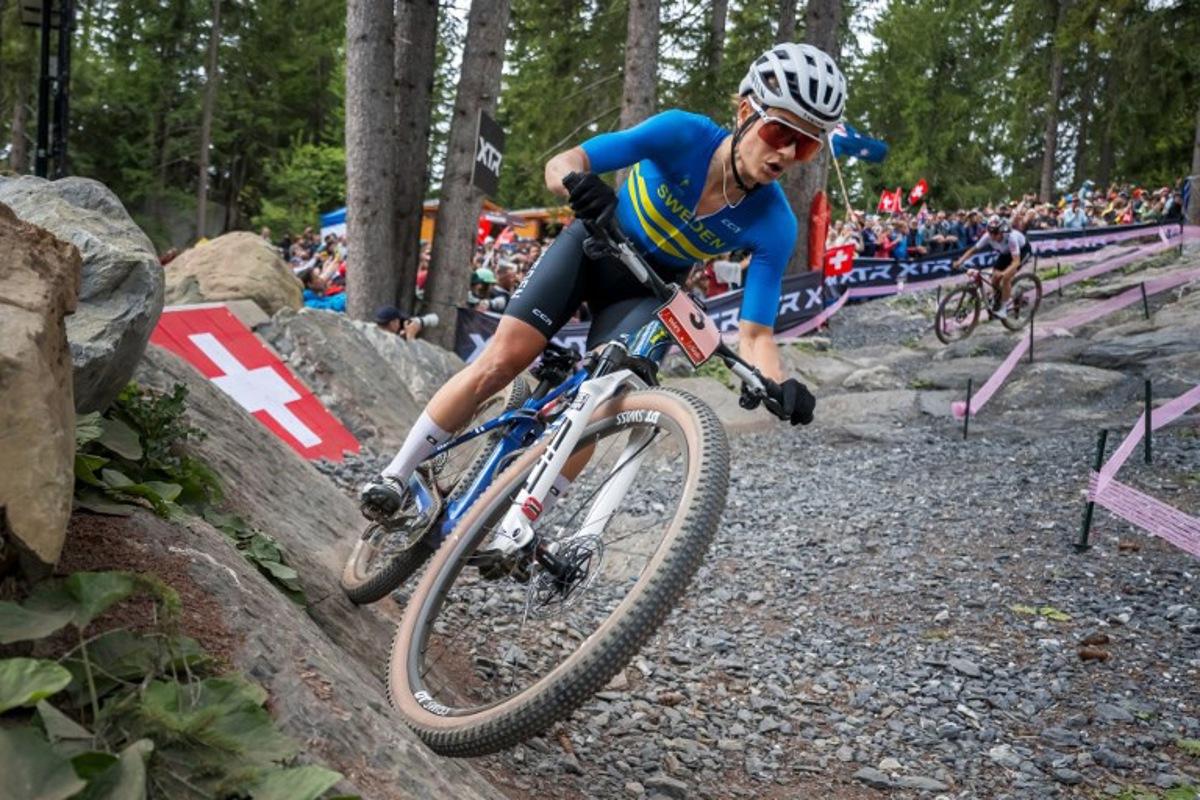 Sweden's Jenny Rissveds competes in the Women's elite Cross-country Olympic race as part of the 2025 UCI Mountain Bike World Championships in Crans-Montana on September 13, 2025. Fabrice COFFRINI / AFP