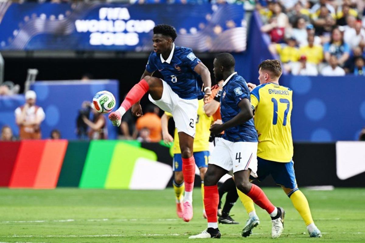 France's midfielder #08 Aurelien Tchouameni controls the ball during the 2026 World Cup round of 32 football match between France and Sweden at the New York/New Jersey Stadium in East Rutherford on June 30, 2026. Jewel SAMAD / AFP