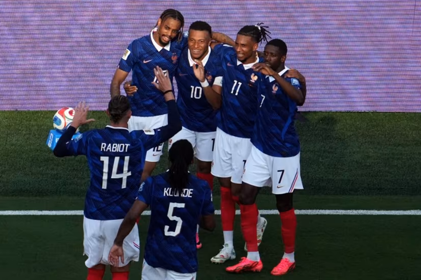 France's forward #10 Kylian Mbappe celebrates scoring his team's third goal with teammates during the 2026 World Cup round of 32 football match between France and Sweden at the New York/New Jersey Stadium in East Rutherford on June 30, 2026. TIMOTHY A. CLARY / AFP