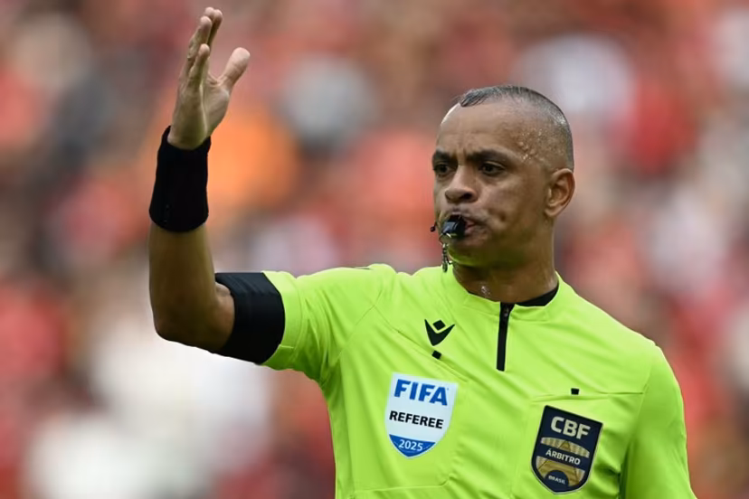 Brazilian referee Wilton Pereira Sampaio reacts during the Brasileirao Serie A football match between Flamengo and Palmeiras at Maracana Stadium in Rio de Janeiro, Brazil on October 19, 2025. Mauro PIMENTEL / AFP