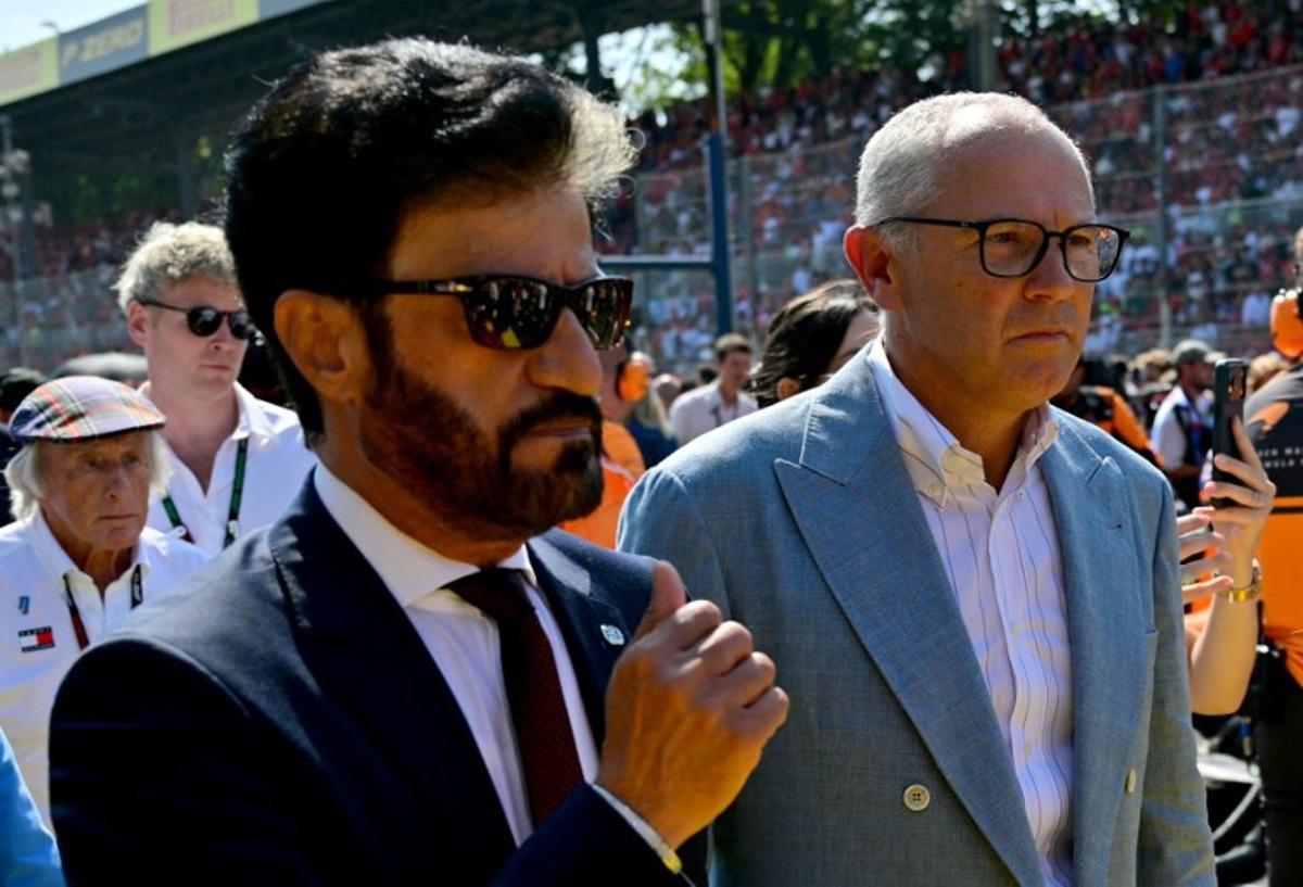 FIA President Mohammed Ben Sulayem (L) walks with Italian CEO of the Formula One Group Stefano Domenicali ahead of the Italian Formula One Grand Prix at the Autodromo Nazionale Monza circuit in Monza, northern Italy on September 6, 2026. Andrej ISAKOVIC / AFP