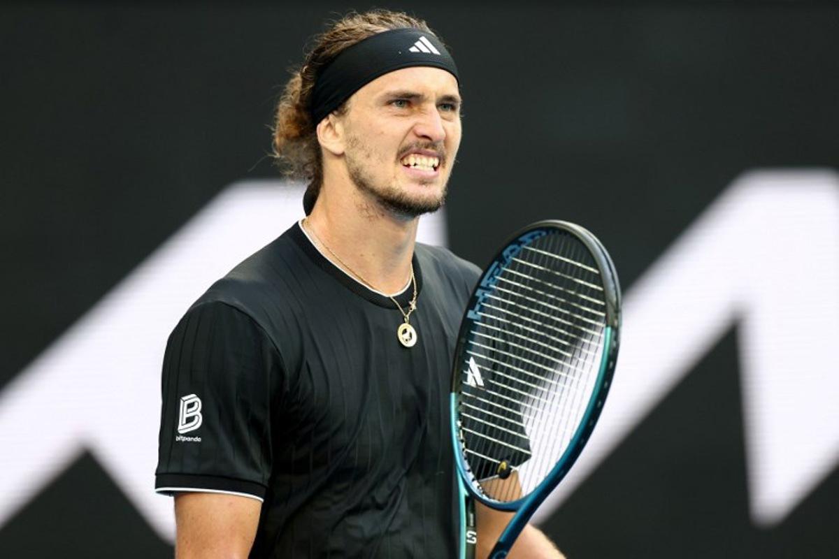 Germany's Alexander Zverev reacts after a point against Argentina's Francisco Cerundolo during their men's singles match on day eight of the Australian Open tennis tournament in Melbourne on January 25, 2026. IZHAR KHAN / AFP