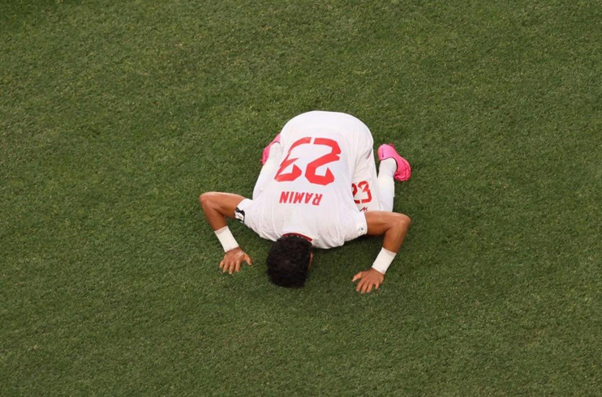 Iran's defender #23 Ramin Rezaeian celebrates scoring his team's first goal during the 2026 World Cup Group G football match between Iran and New Zealand at Los Angeles Stadium in Inglewood on June 15, 2026. Etienne Laurent / AFP