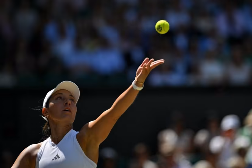 US player Jessica Pegula serves to US player Coco Gauff during their women's singles quarter-final tennis match on the ninth day of the 2026 Wimbledon Championships at The All England Lawn Tennis and Croquet Club in Wimbledon, southwest London, on July 7, 2026. Glyn KIRK / AFP