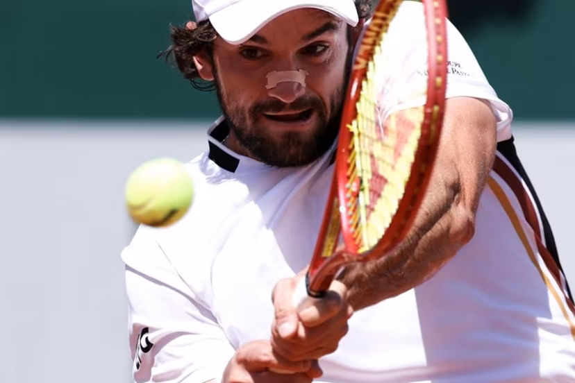 Monaco's Valentin Vacherot plays a forehand return to France's Thomas Faurel during their men's singles match on day 3 of the French Open tennis tournament at the Roland-Garros Complex in Paris on May 26, 2026. Alain JOCARD / AFP