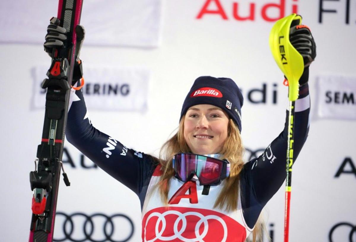 Winner USA's Mikaela Shiffrin celebrates on the podium after the Women's Slalom race of the FIS Alpine Ski World Cup in Semmering, Austria on December 28, 2025. GEORG HOCHMUTH / APA / AFP