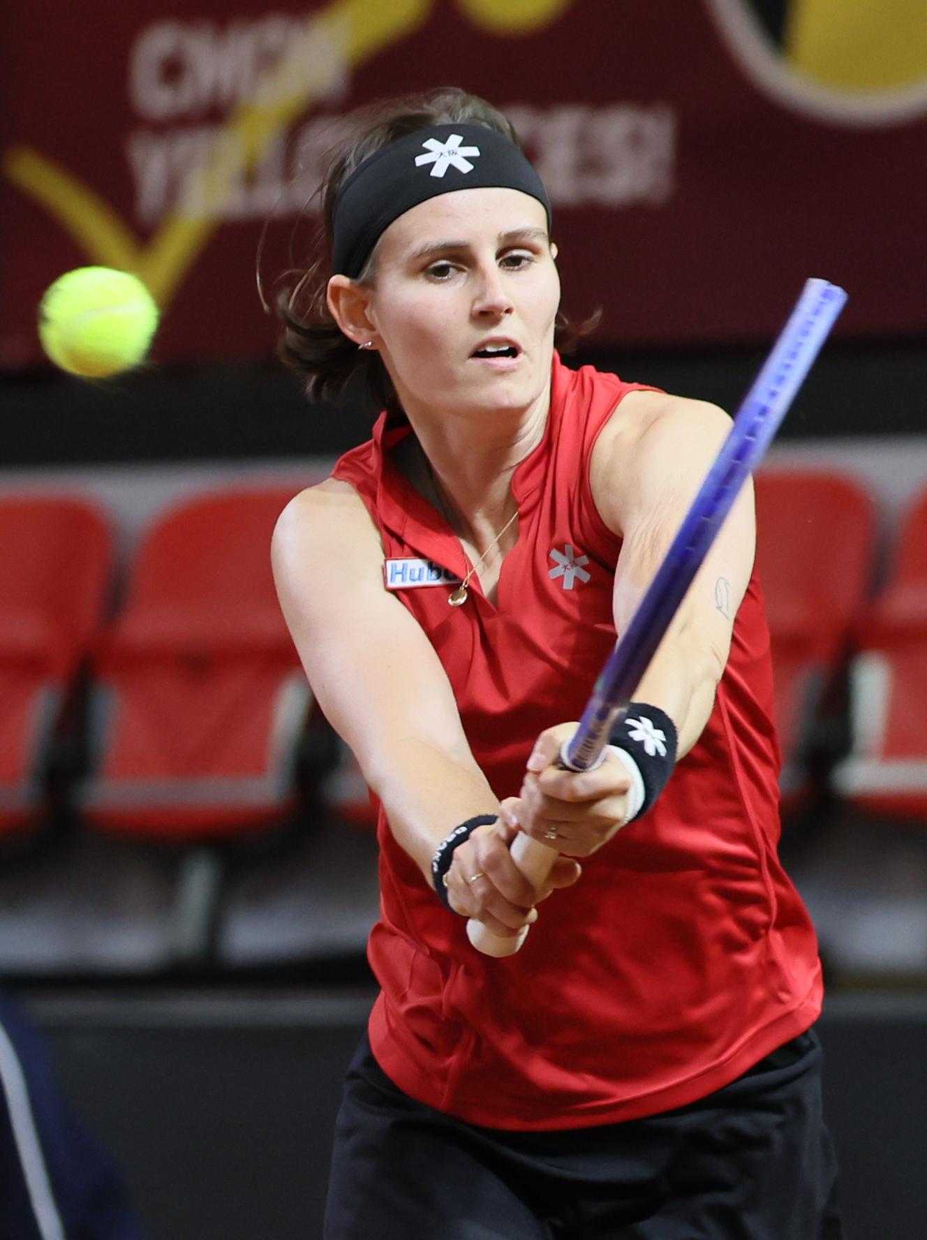 Belgian Greet Minnen pictured in action during the fourth game between Belgian Minnen and US' Jovic on the second day of the qualifiers of the Billie Jean King Cup tennis between Belgium and the USA, in Oostende, Belgium, on Saturday 11 April 2026. The meeting takes place on 10 and 11th April. PHOTO BENOIT DOPPAGNE