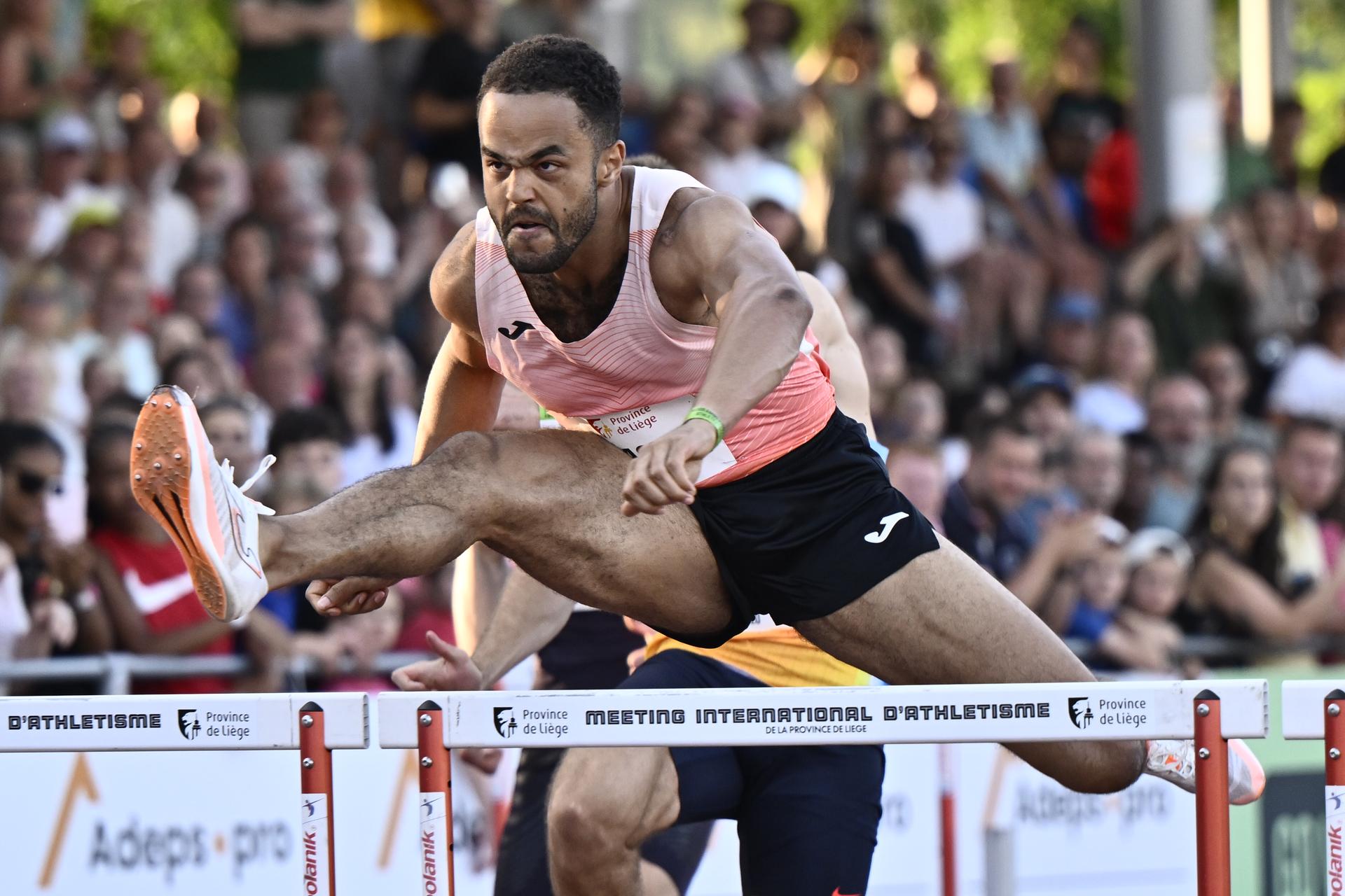 Belgian Michael Obasuyi pictured in action during the 100M hurdles at the 2026 edition of the 'Meeting International d'Athletisme de la Province de Liege' athletics event in Liege, Wednesday 15 July 2026. BELGA PHOTO ERIC LALMAND