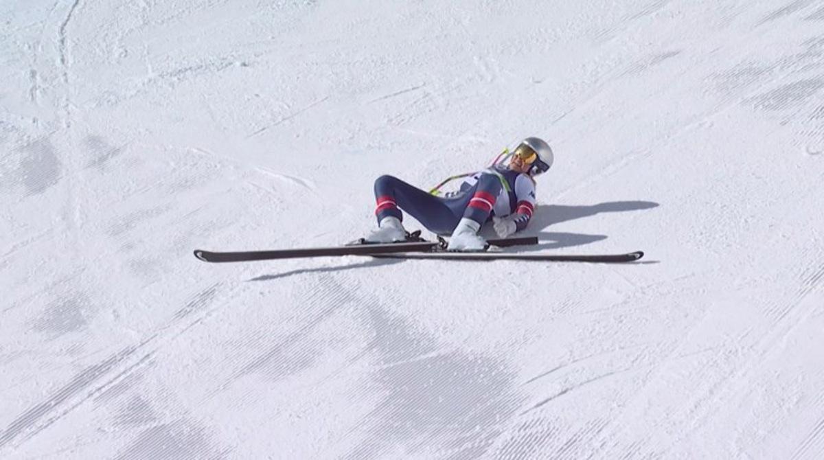 This handout video grab from IOC/OBS shows US Lindsey Vonn crashing during the women's downhill event at the Milano Cortina 2026 Winter Olympic Games in Cortina d'Ampezzo on February 8, 2026. Handout / OIS/IOC / OBS / AFP