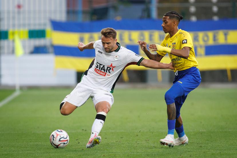 OHL's Wouter George and Beveren's Jearl Margaritha fight for the ball during a soccer match between SK Beveren and OH Leuven, Sunday 6 September 2026 in Beveren, on day 5 of the 2026-2027 'Jupiler Pro League' first division of the Belgian championship. BELGA PHOTO KURT DESPLENTER