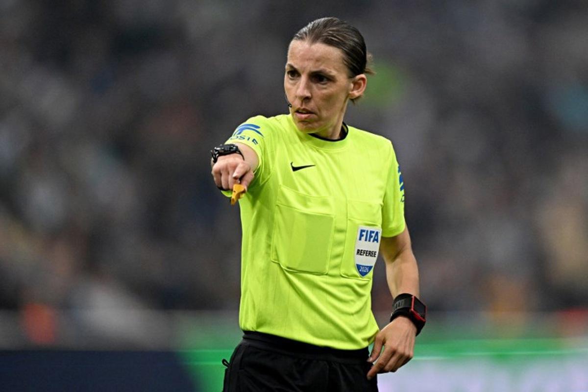 french referee Stephanie Frappart reacts during the French L1 football match between Olympique de Marseille (OM) and Metz FC at the Stade Velodrome in Marseille, southern France on April 10, 2026. Gabriel BOUYS / AFP