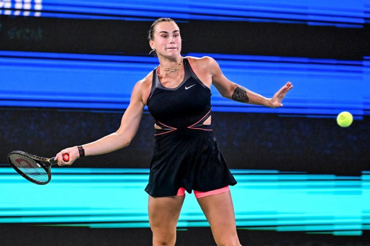 Belarus's Aryna Sabalenka hits a return to USA's Jessica Pegula during their women's singles semi-final match at the Wuhan Open tennis tournament in Wuhan, central China's Hubei province on October 11, 2025. Adek BERRY / AFP