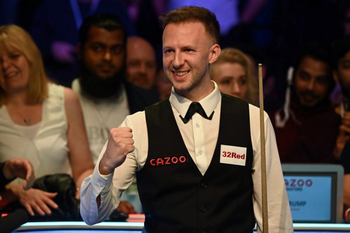 England's Judd Trump celebrates after his victory over Wales' Mark Williams in the Masters snooker tournament final at Alexandra Palace in London on January 15, 2023. Trump won the final 10-8. JUSTIN TALLIS / AFP