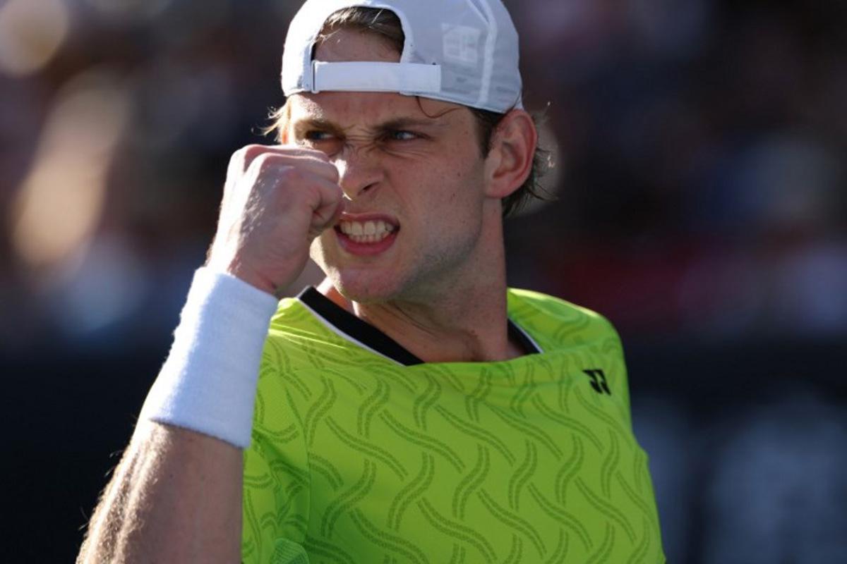 Belgium's Zizou Bergs reacts after a point against Poland's Hubert Hurkacz during their men's singles match on day three of the Australian Open tennis tournament in Melbourne on January 20, 2026. IZHAR KHAN / AFP
