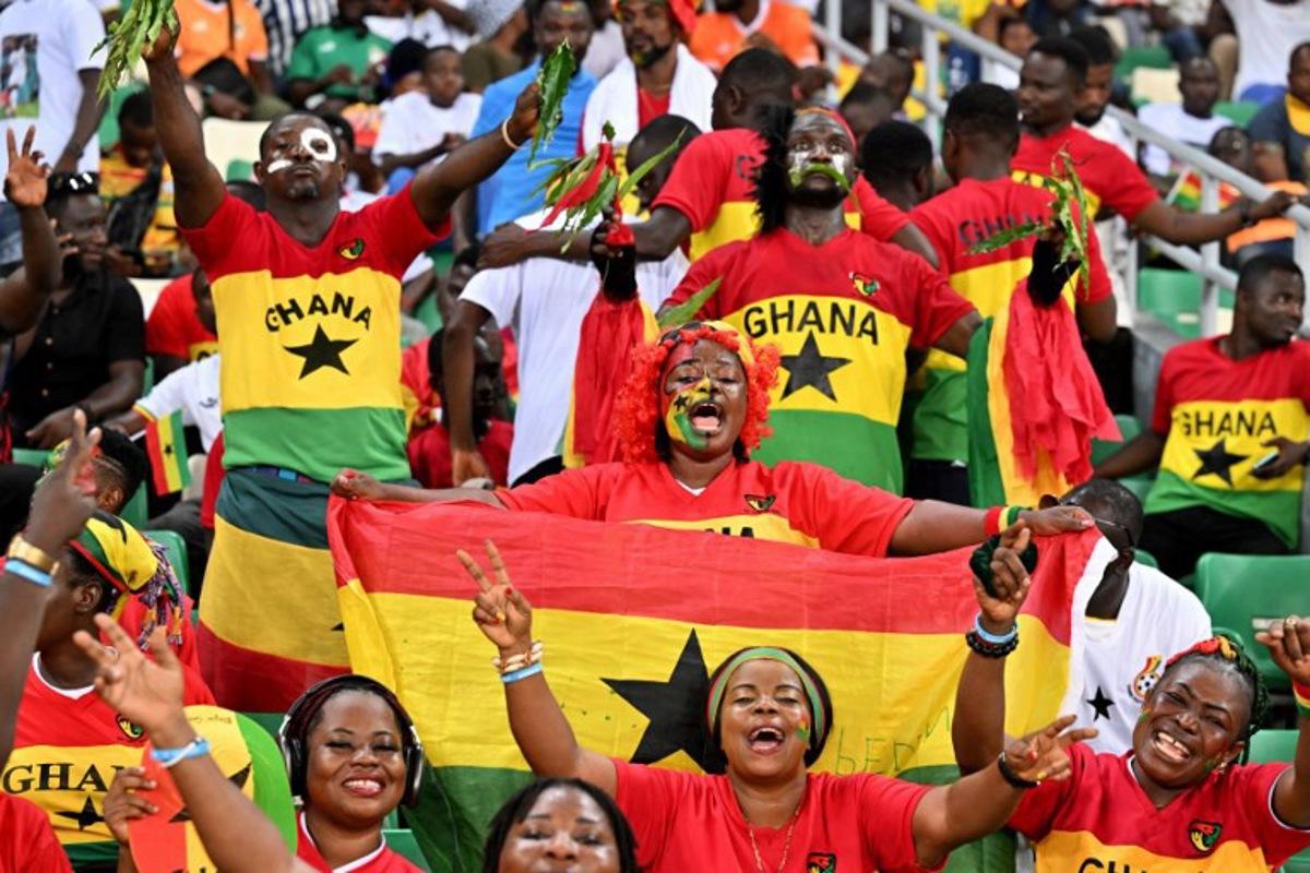 Ghana supporters cheer during the Africa Cup of Nations (CAN) 2024 group B football match between Mozambique and Ghana at Alassane Ouattara Olympic Stadium in Ebimpe, Abidjan on January 22, 2024. Issouf SANOGO / AFP