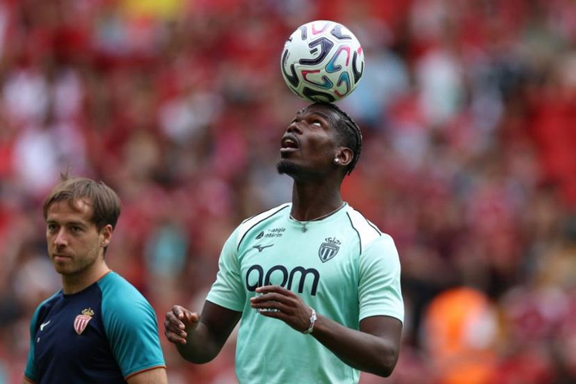 Monaco's French midfielder #08 Paul Pogba on the pitch ahead of the pre-season friendly football match between Liverpool and Monaco at Anfield in Liverpool, north west England on August 9, 2026. Darren Staples / AFP