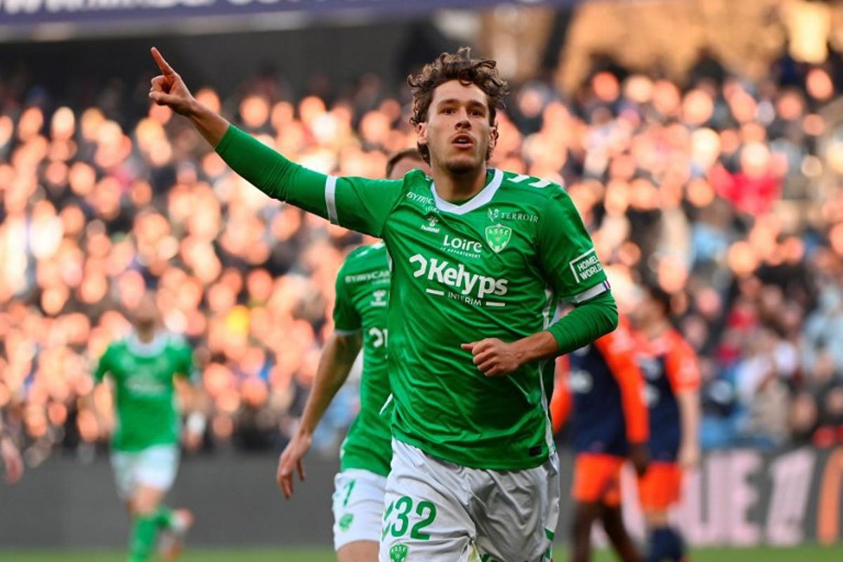 Saint Etienne's Belgian forward #32 Lucas Stassin celebrates after scoring his team's first goal during the French L1 football match between Montpellier Herault SC and AS Saint-Etienne at Stade de la Mosson in Montpellier, southern France, on March 16, 2025. Sylvain THOMAS / AFP