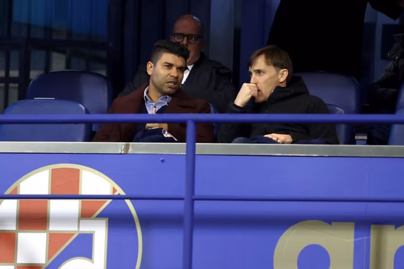 Croatian former football players Eduardo da SIlva (L) and Dario Simic speak during the UEFA Champions League, league phase - day 8 football match between GNK Dinamo Zagreb and AC Milan at Maksimir Stadium in Zagreb on January 29, 2025. Damir SENCAR / AFP