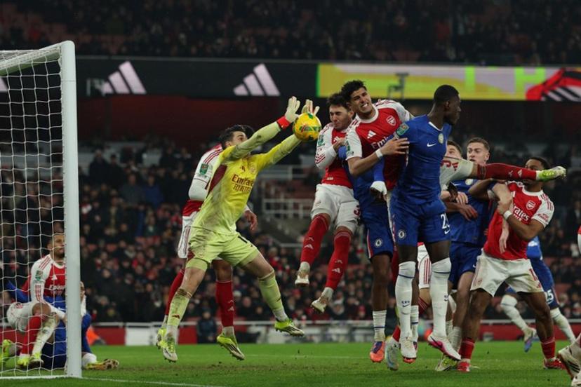 Arsenal's Spanish goalkeeper #13 Kepa Arrizabalaga makes a save during the English League Cup semi final second leg, football match between Arsenal and Chelsea at the Emirates Stadium, in London on February 3, 2026. Adrian Dennis / AFP