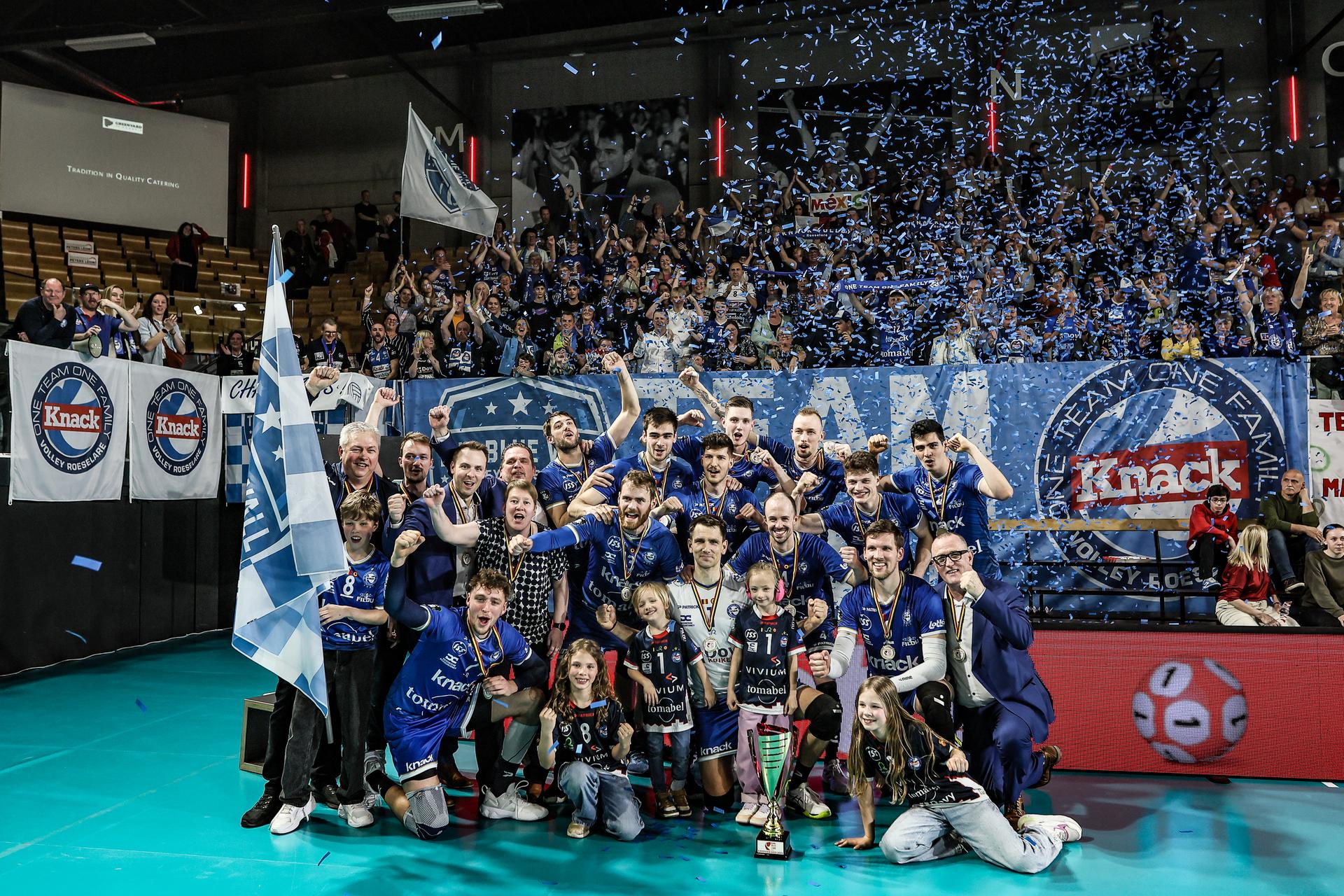Roeselare's players celebrate after winning a volleyball match between Greenyard Maaseik and Knack Roeselare, Sunday 28 April 2024 in Maaseik, the last match of the best-of-five finals in the Play Offs of the Belgian volleyball competition. BELGA PHOTO BRUNO FAHY