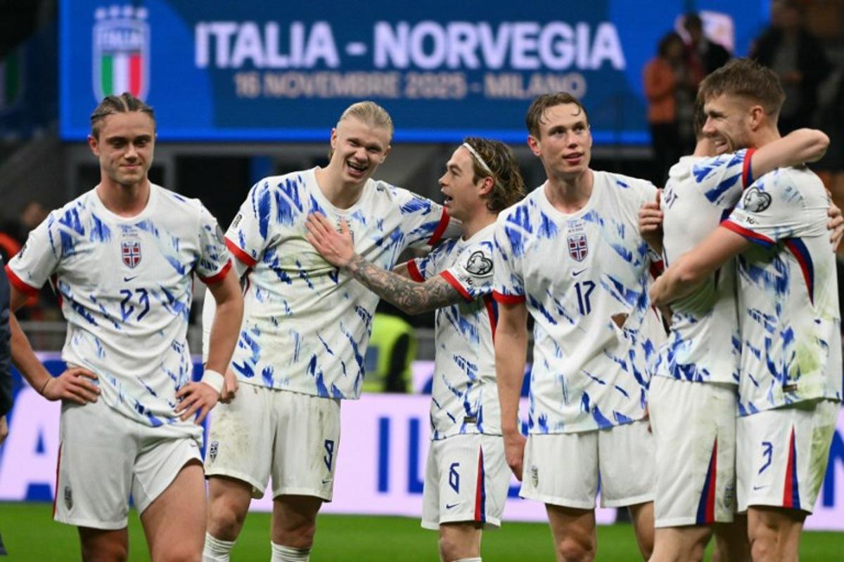 from left : Norway's midfielder #23 Thelo Aasgaard, Norway's captain #09 Erling Braut Haaland, Norway's midfielder #06 Patrick Berg and Norway's defender #17 Torbjorn Lysaker Heggem celebrate their victory at the end of the FIFA World Cup 2026 European qualification football match between Italy and Norway, at the San Siro Stadium, in Milan, on November 16, 2025. Alberto PIZZOLI / AFP