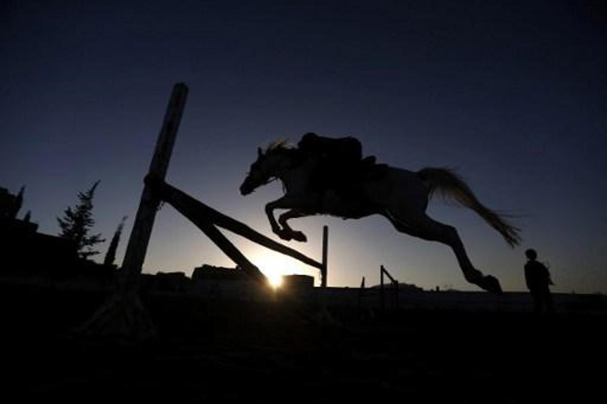 A Yemeni boy competes in the National Horse Jumping Championships in Sanaa on January 9, 2017.
Mohammed HUWAIS / AFP