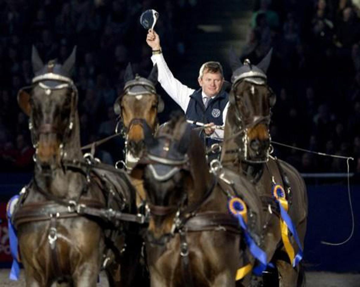 Boyd Exell of Australia, celebrates winning the FEI World Cup Driving event during the Sweden International Horse Show at the Friends Arena in Stockholm, on November 30, 2014. AFP PHOTO/TT NEWS AGENCY/ MAJA SUSLIN -SWEDEN OUT- SWEDEN OUT