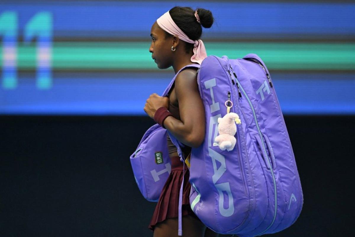 USA's Coco Gauff leaves the court after losing her women's singles match against Belgium's Elise Mertens at the China Open tennis tournament in Beijing on October 7, 2026. Adek BERRY / AFP
