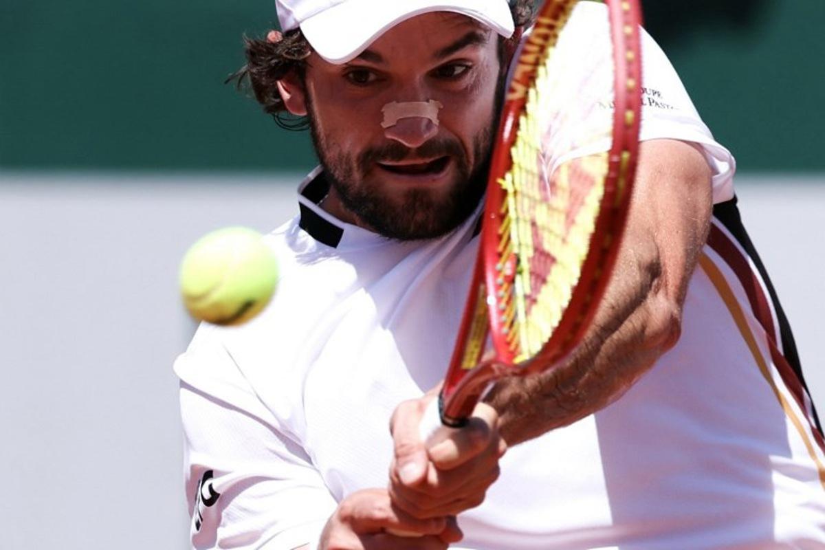 Monaco's Valentin Vacherot plays a forehand return to France's Thomas Faurel during their men's singles match on day 3 of the French Open tennis tournament at the Roland-Garros Complex in Paris on May 26, 2026. Alain JOCARD / AFP