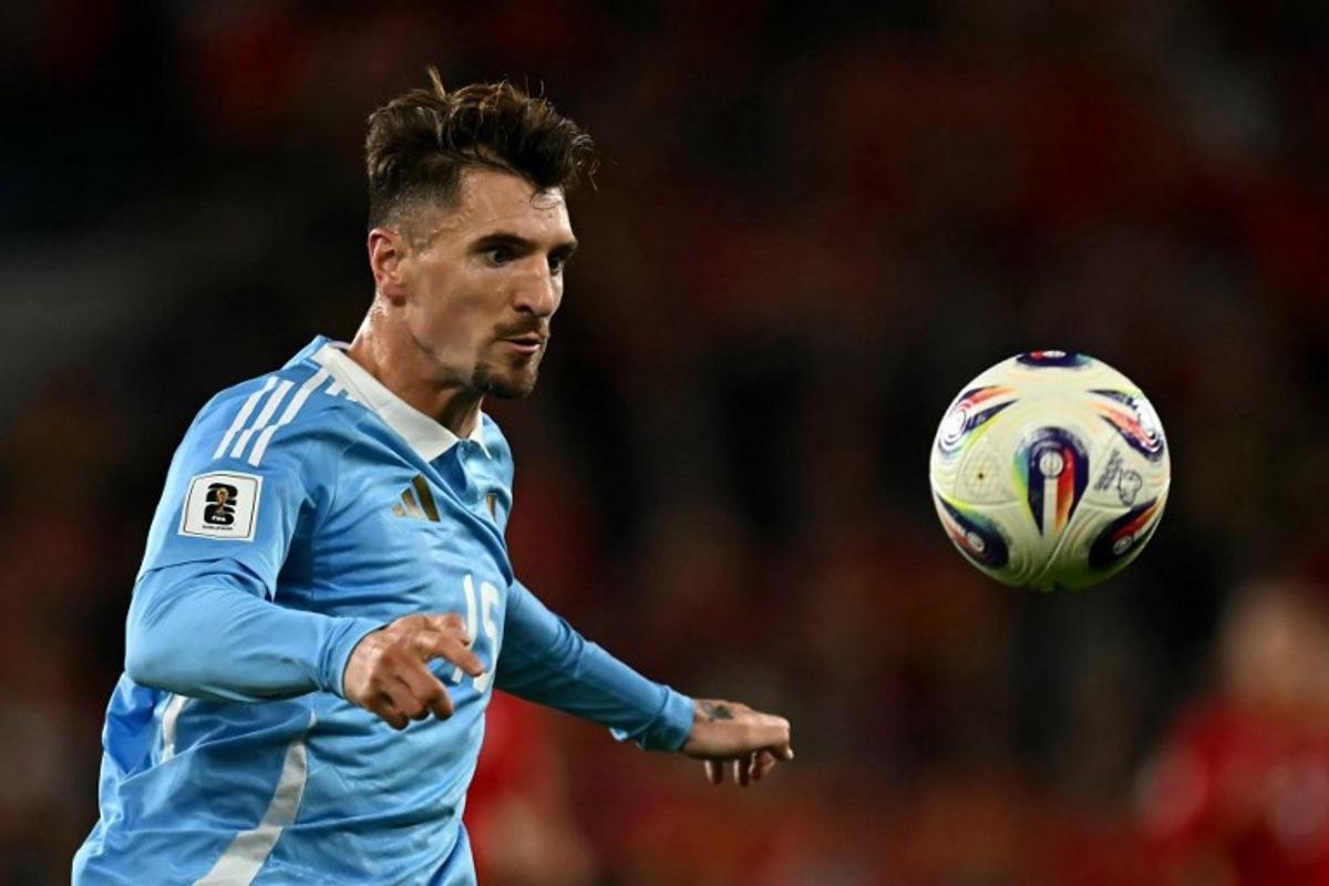 Belgium's defender #15 Thomas Meunier focuses on the ball during the 2026 World Cup Group J qualifier football match between Wales and Belgium, at Cardiff City Stadium, in Cardiff, on October 13, 2025. Paul ELLIS / AFP