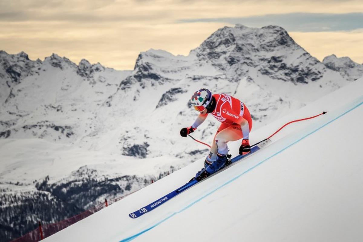 Switzerland's Michelle Gisin competes during a Women's downhill training as part of the FIS Alpine ski World Cup 2025-2026, in St Moritz on December 11, 2025. Fabrice COFFRINI / AFP