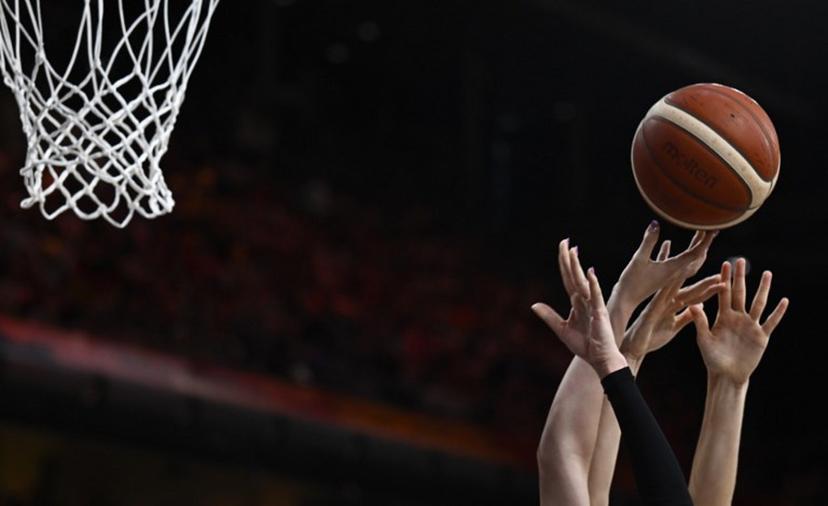 Players vie for the ball during the 2026 FIBA Women's Basketball World Cup Group A match between Germany and Japan at the Berlin Arena in Berlin on September 5, 2026. Tobias SCHWARZ / AFP