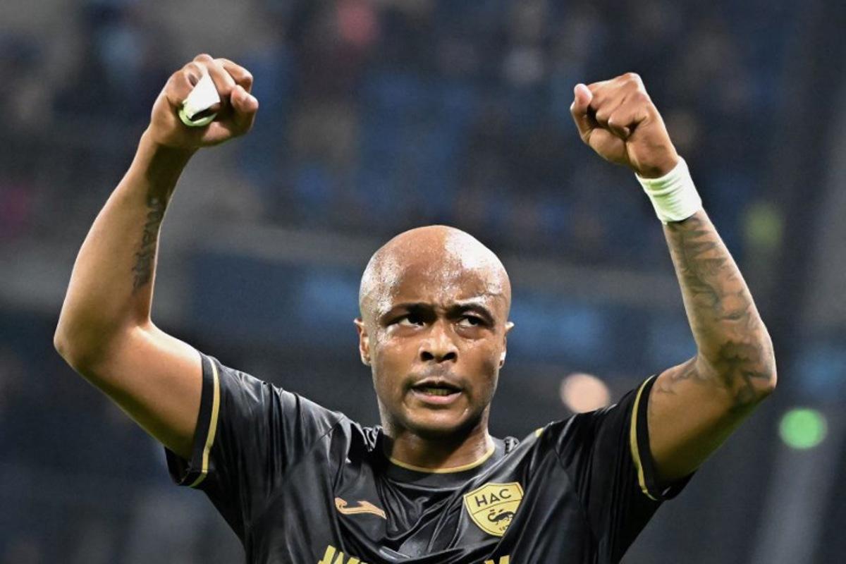 Le Havre's Ghanian forward #28 Andre Ayew celebrates after winning the French L1 football match between Le Havre AC (HAC) and Montpellier HSC at the Oceane Stadium in Le Havre, Northwestern France, on November 3, 2024. Lou BENOIST / AFP